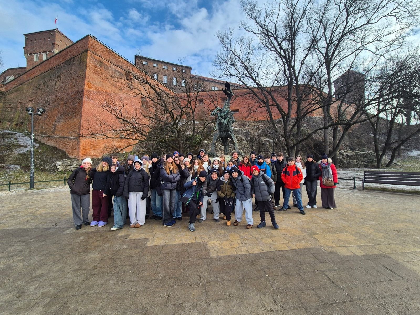 Accompanying teachers with a group of pupils at Wawel Castle, Kraków